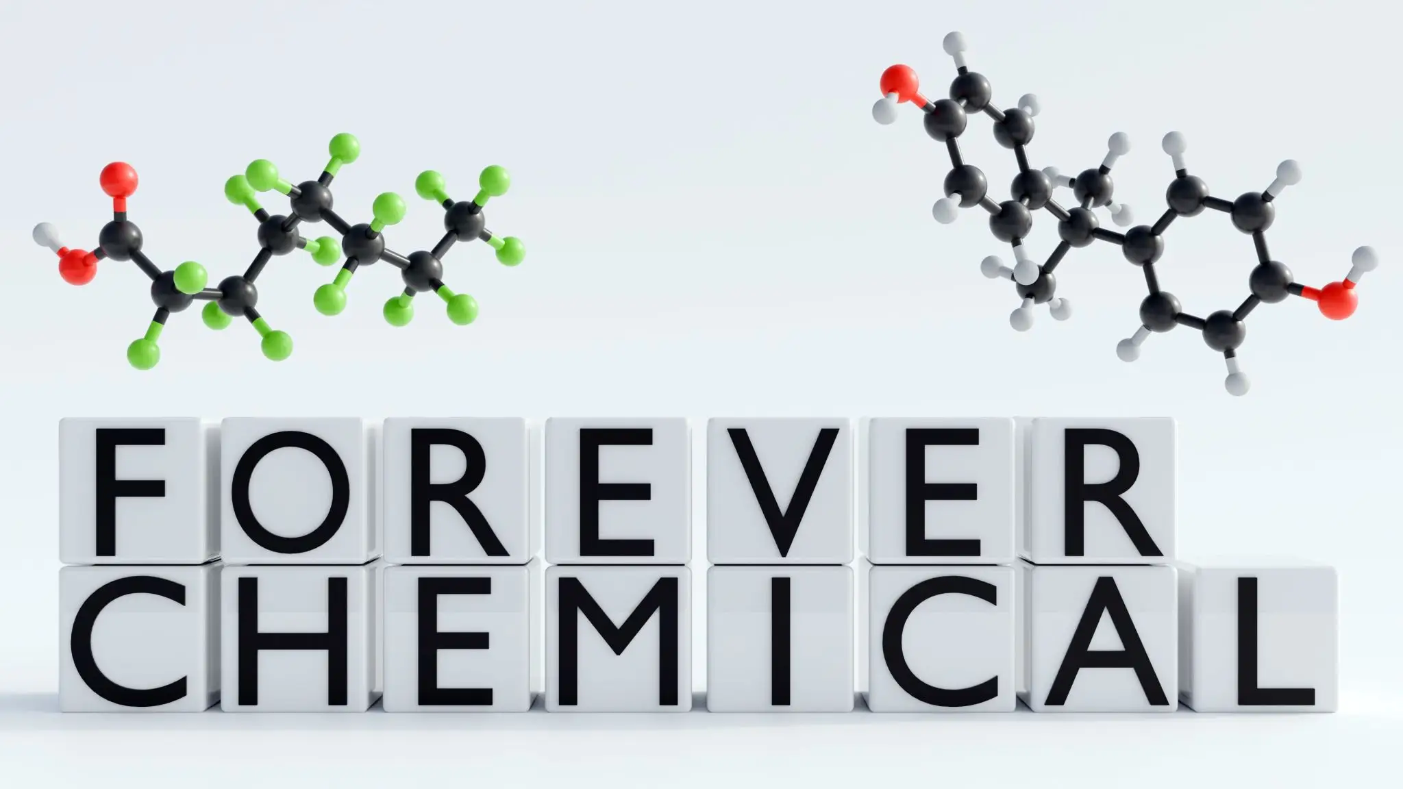 Molecular models with blocks spelling "FOREVER CHEMICA".